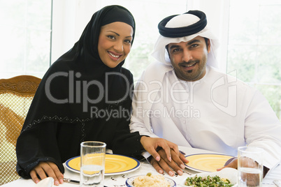 A Middle Eastern couple enjoying a meal