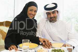 A Middle Eastern couple enjoying a meal