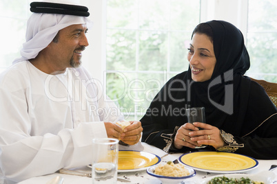 A Middle Eastern couple enjoying a meal
