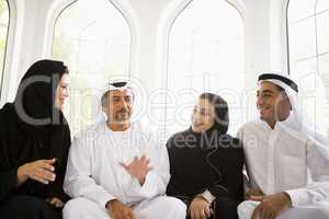 A Middle Eastern family sitting together
