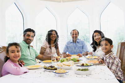 A Middle Eastern family enjoying a meal together