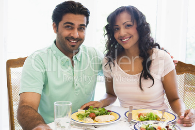 A Middle Eastern couple enjoying a meal together