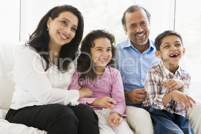 A Middle Eastern couple with their grandchildren