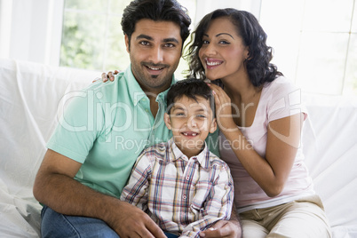 A Middle Eastern couple with their son