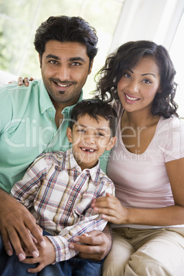 A Middle Eastern couple with their son