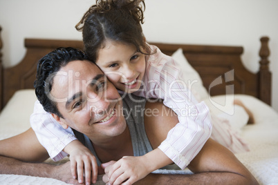 A Middle Eastern man with his daughter