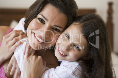 A Middle Eastern woman with her daughter