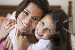 A Middle Eastern woman with her daughter