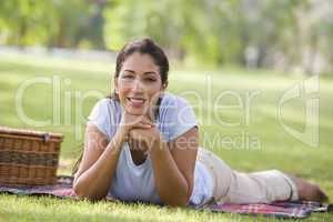 beautiful woman having picnic in the park