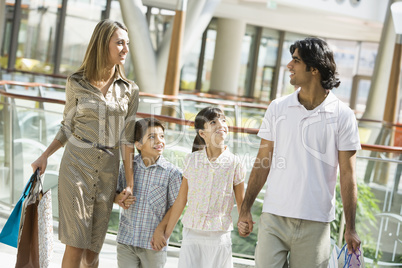 family in shopping mall
