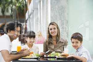 Young family having  a meal