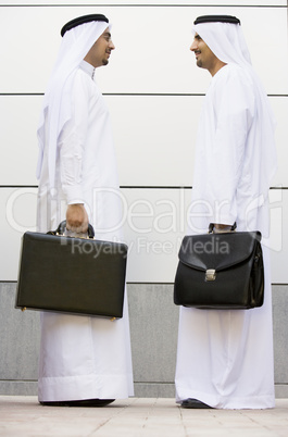 Two oriental businessman