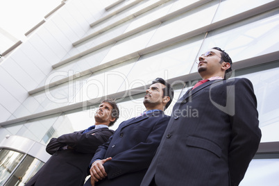 Group of businessmen outside office
