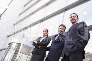 Group of business people outside office building