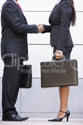 Cropped image of business meeting outside office