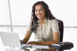 Businesswoman working at desk