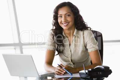 Businesswoman working at desk