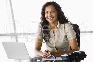 Businesswoman working at desk
