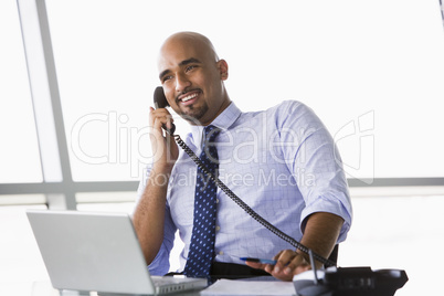 Businessman talking on phone