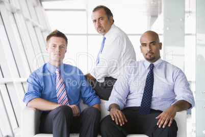 Group of businessmen sitting in lobby