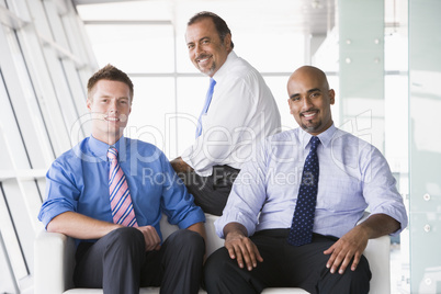Group of businessmen sitting in lobby