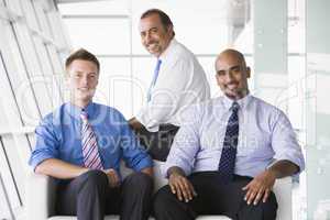 Group of businessmen sitting in lobby