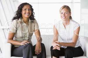 Businesswomen sitting in lobby