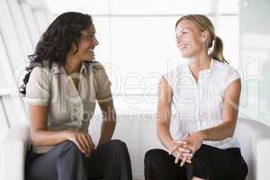 Businesswomen talking in lobby