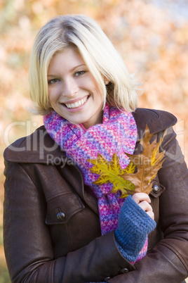 Blonde young woman in autumn outfit