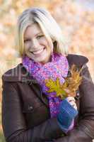 Blonde young woman in autumn outfit