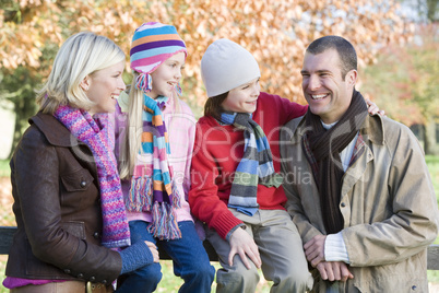 A young family in autumn outfit