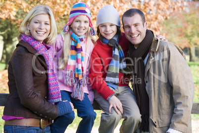 Family in the forrest in fall time