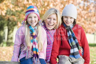 mother and daughters n the forest