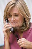 Consultant phoning client with good news