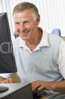 Senior man working on a computer
