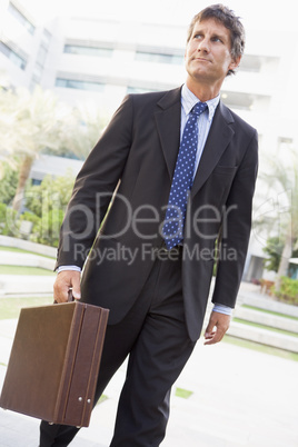 Businessman walking outdoors