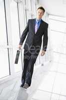 Businessman walking in corridor