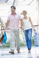Couple shopping in mall