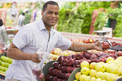 Man shopping in produce section