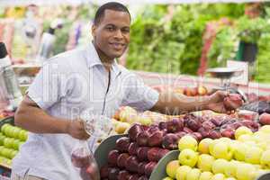 Man shopping in produce section