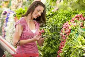 Woman shopping in produce section