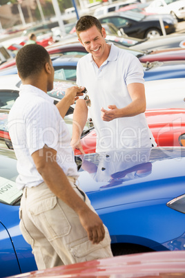 Man collecting new car