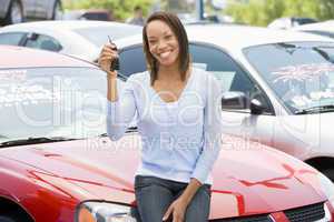 Woman picking new car