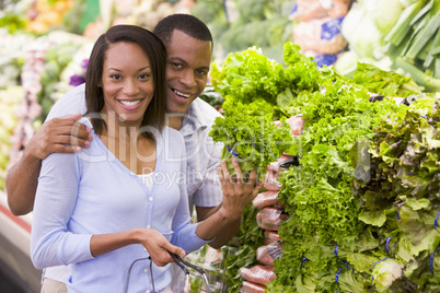 Couple buying fresh produce