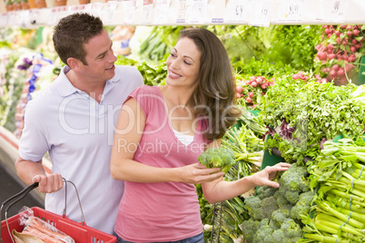 Young couple shopping for fresh produce