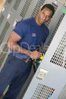 Portrait of a firefighter in the fire station locker room