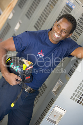 Portrait of a firefighter in the fire station locker room