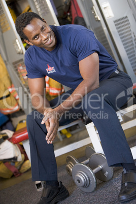 Portrait of a firefighter in the fire station locker room