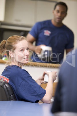 Firefighters relaxing in the staff kitchen