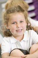 Schoolgirl sitting in primary class